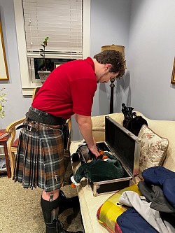 Josh unpacks his pipes for the Burns Supper at St. John’s Episcopal Church 2024