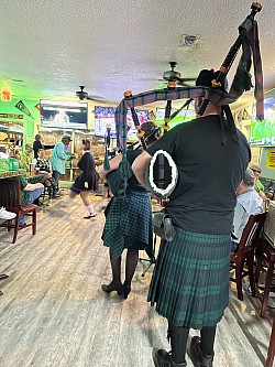 Mrs Doss leads the pipers in to Val’s 2022