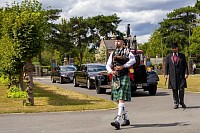 Piper leading funeral cortege